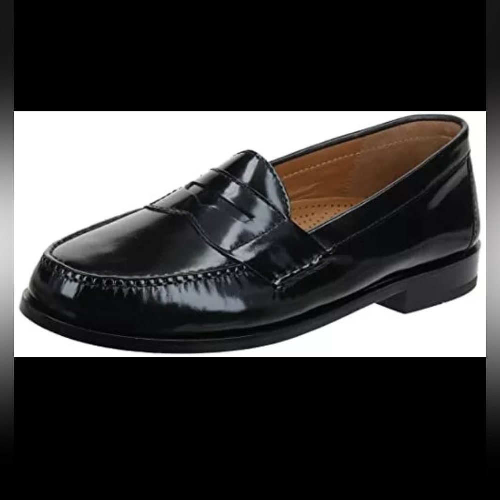 Brand new Cole Haan Pinch Penny Loafers in Black. 9.5E WIDE